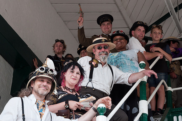 Steampunks pose on the Markfield Steam Beam Engine